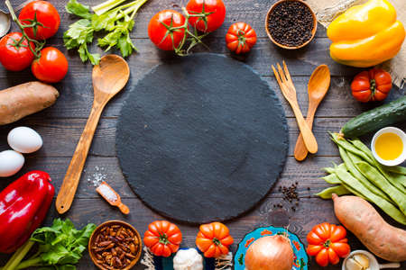Different types of vegetables, on a old wooden table, space for text. Top viewの写真素材