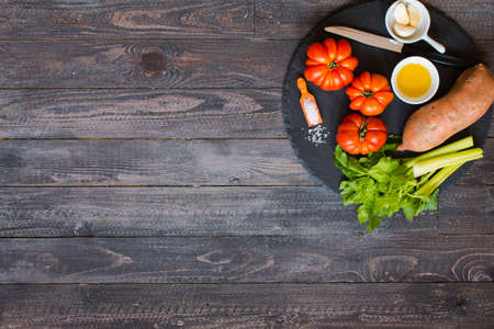 Different types of vegetables, on a old wooden table, space for text. Top viewの写真素材