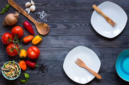 Delicious pasta with fresh vegetables and cheese, on a wooden background . Top viewの写真素材