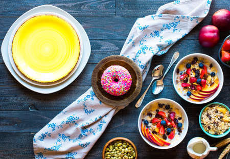 Healthy breakfast with milk,muesli and fruit, on a wooden background. Top viewの写真素材