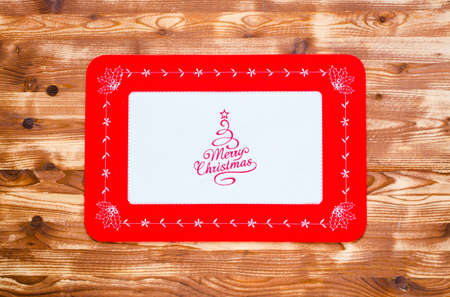 Traditional Italian Christmas cake with chocolate and various xmas decorations, free space for textの写真素材