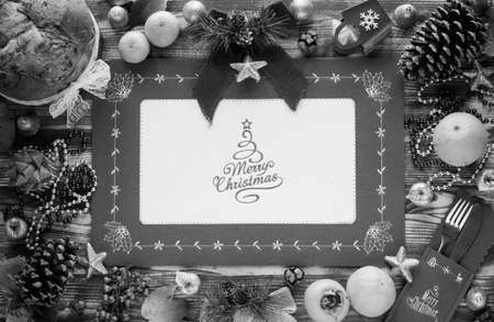 Traditional Italian Christmas cake with chocolate and various xmas decorations, free space for textの写真素材