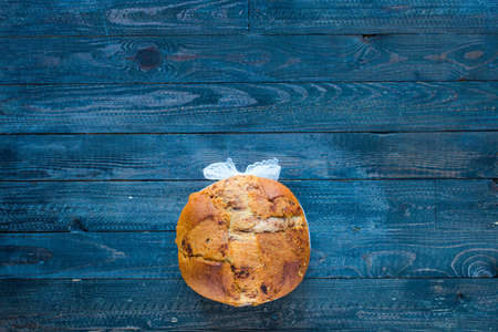 Traditional Italian Christmas cake with chocolate and various xmas decorations, free space for textの写真素材