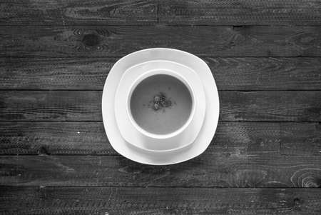 Homemade Pumpkin Soup on rustic wooden background, free space for text. Top viewの写真素材