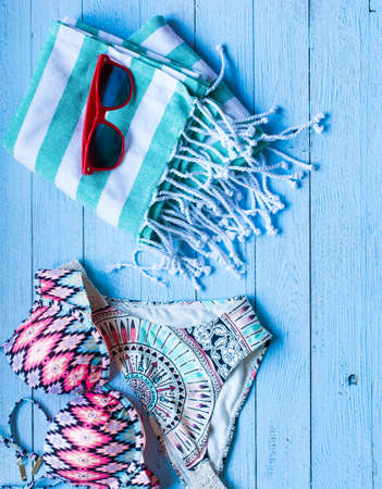 Summer fashion women swimsuit bikini, vacation concept, free space before text. Top viewの写真素材
