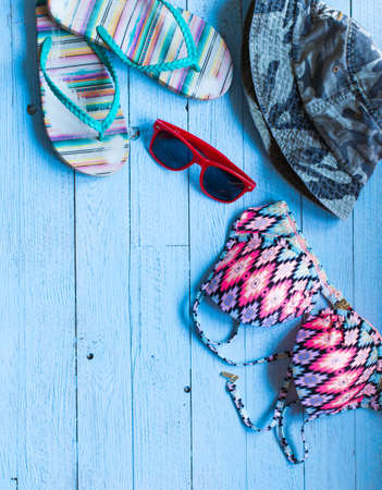 Summer fashion women swimsuit bikini, vacation concept, free space before text. Top viewの写真素材