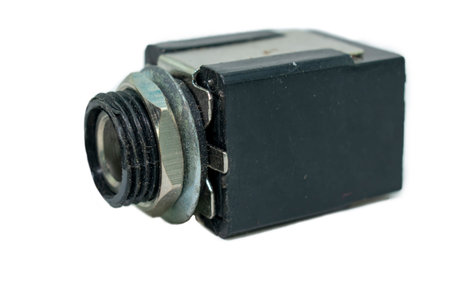 Old camera isolated on white background. Close-up. Selective focus.