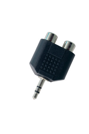 Close up of a black audio jack isolated on a white background.