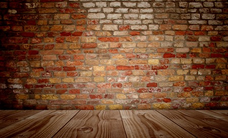 Conceptual old vintage dark brick wall and wood floor backgroundの写真素材