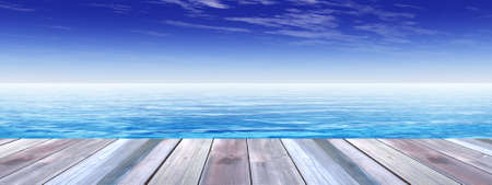 Concept or conceptual wood deck over blue sea and sky background bannerの写真素材