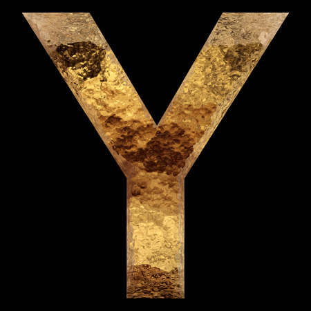 Yellow gold or golden metal fonts isoalted on black backgroundの写真素材