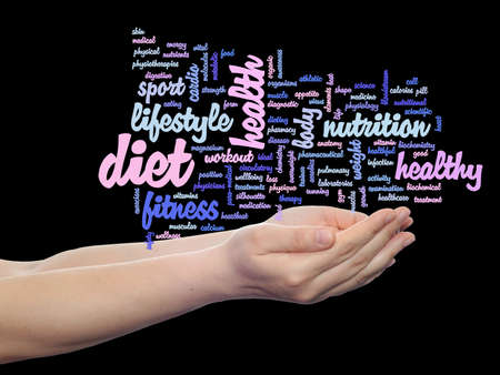 Conceptual health word cloud in hands isolated on backgroundの写真素材