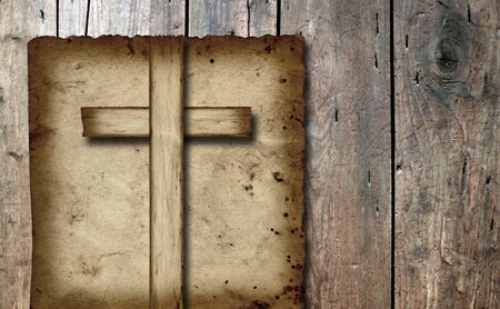 Old vintage Christian paper cross over wood wall backgroundの写真素材