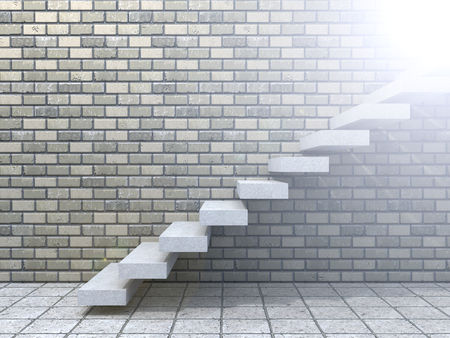 Conceptual white stone or concrete stair or steps near a brick wall backgroundの写真素材
