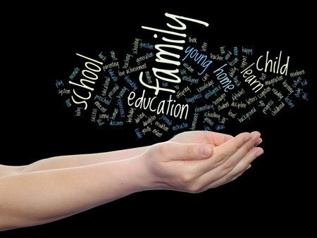 Conceptual education word cloud in hands isolated on background