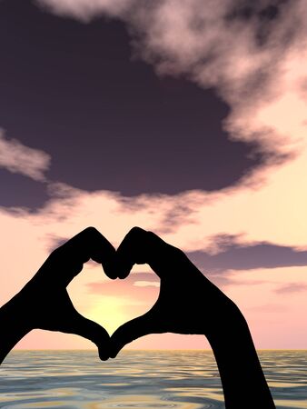 Conceptual heart shape sunset silhouette backgroundの写真素材