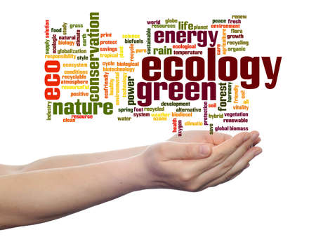 Conceptual ecology word cloud in hands isolated on backgroundの写真素材