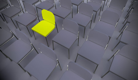 Concept or conceptual yellow armchair standing out in a  conference room as a metaphor for...
