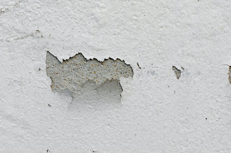 white wall with cracks