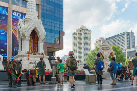 Bangkok, Thailand- August 24,2016 : Trimurati buddha statue in front of central world plazaのeditorial素材