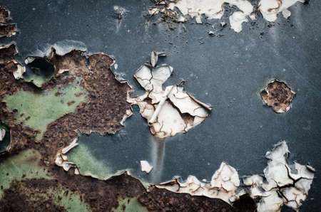 Corroded and peeled metal with rust textureの写真素材
