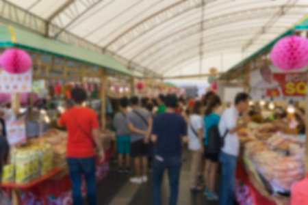 Abstract blur image of food stall at indoor marketの写真素材