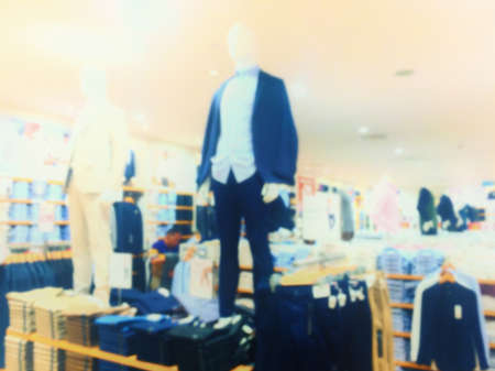 vintage style blurred image background with clothing storeの写真素材