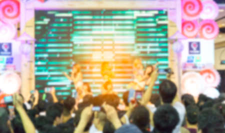 Abstract blurred . a crowd of people at a concertの写真素材