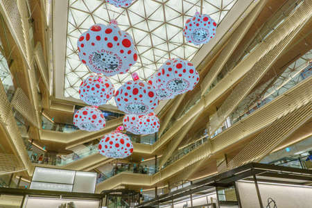 TOKYO , JAPAN - July 26, 2017 : Models of pumpkins by Kusama Yayoi hang from the ceiling of Ginzasix shopping center.のeditorial素材