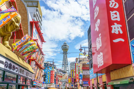 OSAKA , JAPAN - June 29 2018 :Tsutenkaku Tower. Tsutenkaku is a symbol of a new world in Osaka which was built in 1912. Tourists come enjoy restaurants and bars in this area .のeditorial素材