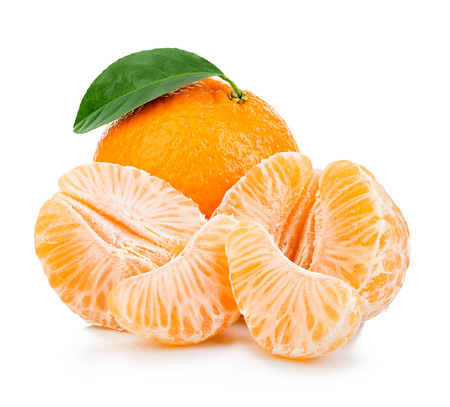 Ripe mandarin with leaf close-up on a white background. Tangerine orange with leaf on a white background.の写真素材