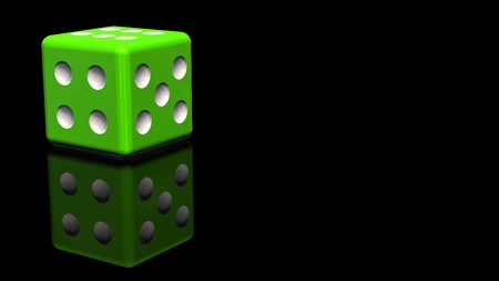 Green Dice - reflected on a black backgroundの写真素材