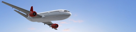 Modern Passenger airplane flight in blue sky panoramaの写真素材