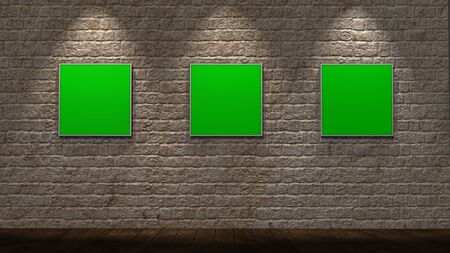 greenscreen frames on old brick wall illuminated with spot lightsの写真素材