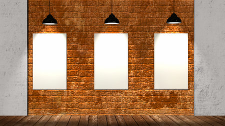 Three blank frames on brick wall and wooden floor illuminated with spotlights