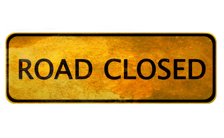 Road closed - old yellow signの写真素材