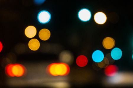 blurred lights of Night city street and car trafficの写真素材
