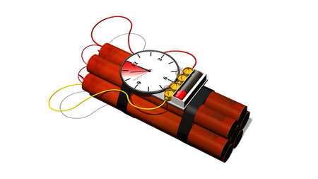 Dynamite bomb with clock timer - isolated on white