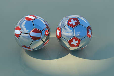 Two reflecting balls with flags of Austria and Switzerland, 3D rendering with reflections and blue sky with cloudsの写真素材
