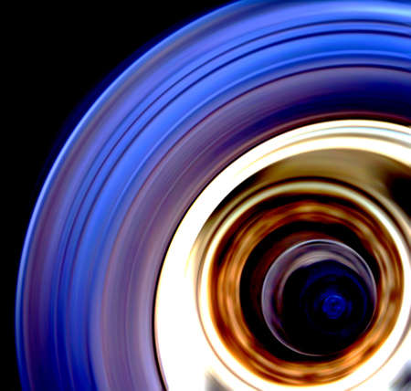 Truck wheel captured on highway with motion blur. Very dynamic image and unusual view.の写真素材