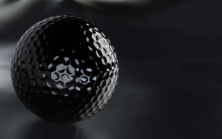 Detailed 3D-render of a black, glossy golf ball over a dark grainy surface.の写真素材