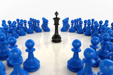 High quality 3D render of black chess king encircled by over fifty blue pawns. Superb reflections and medium depth of field over bright reflecting surface.の写真素材