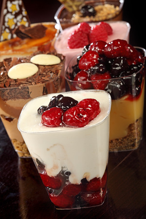 fruit cream cake with raspberry, blueberry, chocolateの写真素材