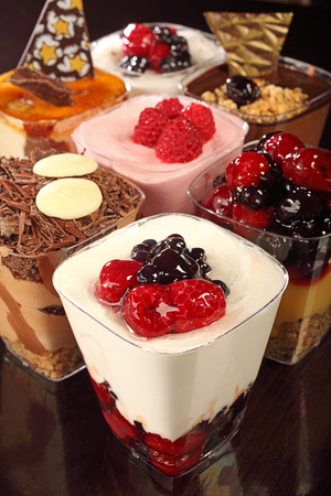 fruit cream cake with raspberry, blueberry, chocolateの写真素材