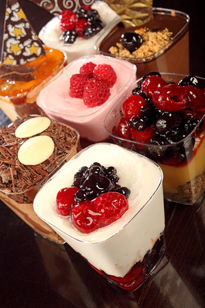 fruit cream cake with raspberry, blueberry, chocolateの写真素材