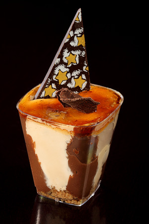 cream cake with chocolate and nutsの写真素材