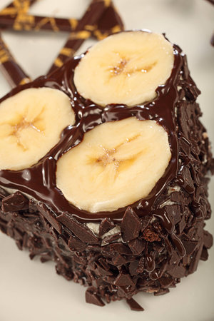 chocolate cream cake with bananasの写真素材