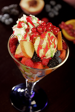 fresh fruit mix dessert salad with ice creamの写真素材