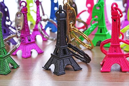 Eiffel tower statue. Paris tourism illustration. Beautiful metallic plastic souvenir statue. Colorful illustration of french tourism or any other concept.の写真素材