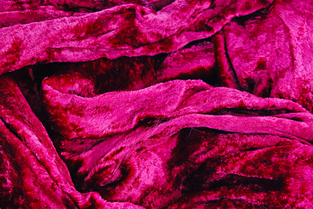 Purple pink velvet fashion fabric closeup pattern texture as background. Macro photo. .の写真素材